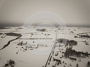 country roads in winter and small village from above - vintage retro look