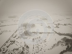 country roads in winter and small village from above - vintage retro look