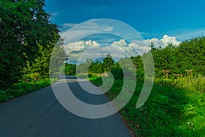 country side green environment space with asphalt road transportation path way route