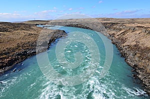 Country side of Iceland with a flowing river