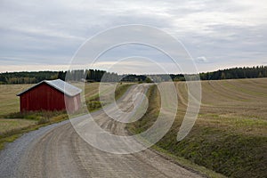 Country side road on a cloudy day.