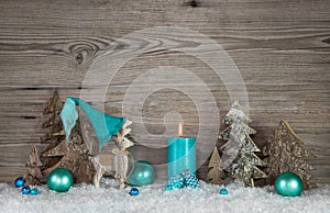 Country style greeting card for christmas with candle and reinde