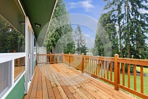 Country style house with a large wooden porch