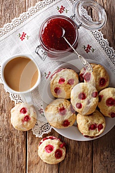 Country style scones with berries are served with English tea an