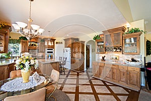 Country-style Tuscan kitchen with wooden furnitur