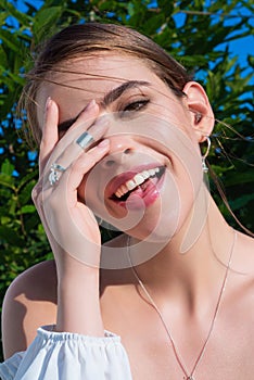 Country style woman, close up woman portrait in nature at the village outdoors. Beautiful sensual girl on summer day at