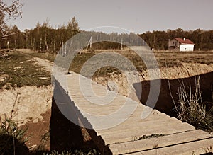 Country summer landscape with wooden breach