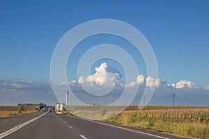 Country two lines road with truck lorry ahead