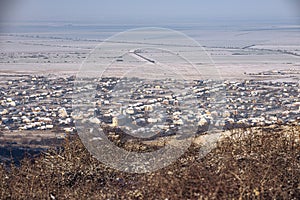 Country village in Winter with a church