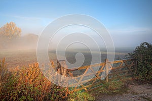 Countryside background with gate photo