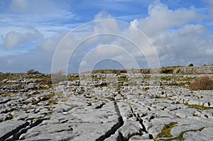 Countryside of Burren with blue cloudy skies photo
