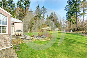 Countryside house. Backyard with patio area