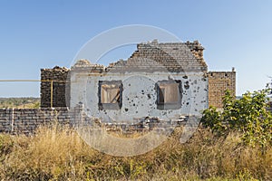 Countryside. A house destroyed by shelling. War in Ukraine