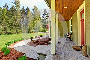 Countryside house exterior. View of entrance porch and curb appeal