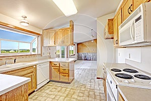 Countryside house interior. Kitchen room with vaulted ceilign an