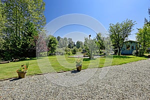 Countryside house with large backyard. Nature landscape