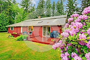 Countryside house with walkout red deck.