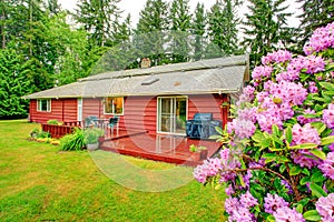 Countryside house with walkout red deck.