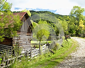 Countryside Landscape with Old Cottage and Road