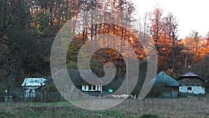 Countryside landscape with old houses in autumn season