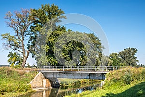 Countryside landscape railroad steel bridge over water canal