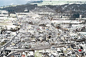 Countryside landscape with traditional village in the valleys of moselle river in germany on cold winter morning