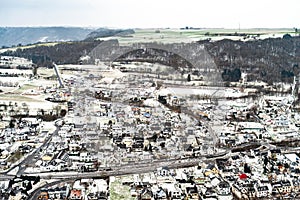 Countryside landscape with traditional village in the valleys of moselle river in germany on cold winter morning