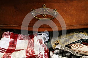 Countryside Old Clothing in Drawer, Vintage Rural Patterns in Ancient Wooden Desk, Furniture. Country Style Still Life.