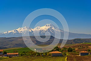 Countryside panorama with a peak of mount Erciyes, rural landscape Turkey