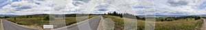 Countryside road, mountain forest and agriculture field