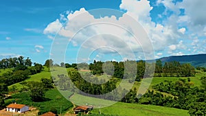 Countryside rural clouds Timelapse. Tropical scenery. Motion at blue sky.