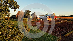 Countryside scenery at Fall season. Autumn colors. Harvest, harvesting time. Rural landscape. Aerial, view from above of the Farm