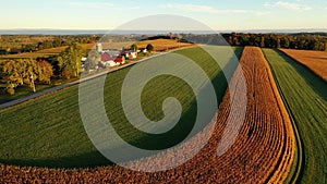 Countryside scenery at Fall season. Autumn colors. Harvest, harvesting time. Rural landscape. Aerial, view from above of the Farm