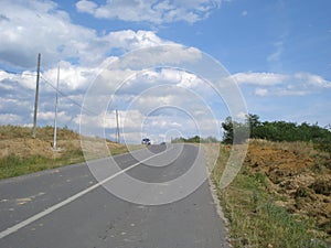 Countryside sloping road, with construction works on sides