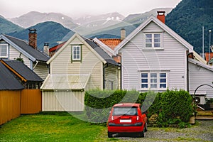 Countryside view of colored wooden buildings. Boathouses in Norway. Scandinavian traditional boat houses. multi-colored garage