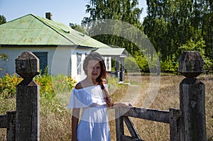 Countryside woman in summer farm ranch in village of Ukraine