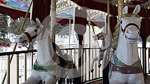 County fair fairground merry-go-round at daytime in winter