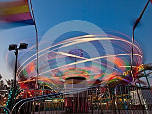 County Fair ride, at night, in motion. Gwinnett County, GA.