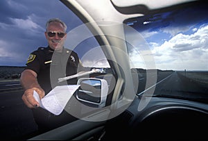 County sheriff giving speeding ticket in North New Mexico