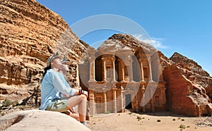 Couple in Ad Deir the Monastery Temple in Petra, Jordan