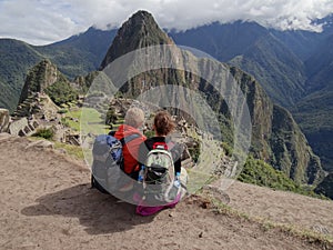 Couple admiring Machu Picchu