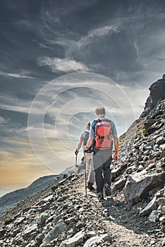 A couple during an alpine trek