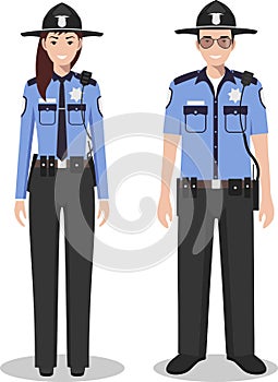 Couple of american policeman and policewoman standing together on white background in flat style. Police USA concept. Flat design