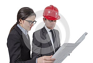 Couple of architects revising a house project on white background