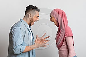 Couple Arguing. Furious Muslim Couple Shouting At Each Other, Having Relationship Problems