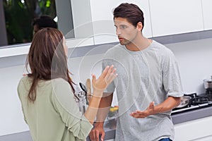 Couple arguing in the kitchen