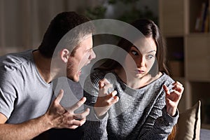 Couple arguing and shouting at home
