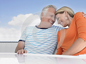 Couple With Arm Around On Yacht