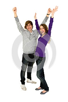Couple with arms raised
