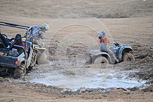 Couple of ATV's Stuck in the Mud